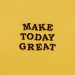 Simple and motivational quote 'Make Today Great' on a minimalist yellow background for inspiration.